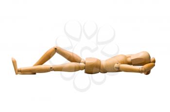 Wooden mannequin lying down, isolated on white.