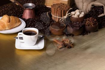Still-life with coffee, coffee beans and spices. Coffee time concept