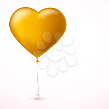 Bright yellow inflatable balloon in the shape of big heart with tape on white background. Greeting card for your friends, loved ones with a bouncy ball in form heart.