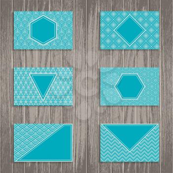 business, greeting or gift cards with blue geometric pattern on wooden background. vector illustration - eps 10