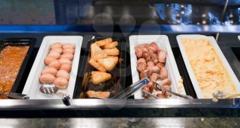 self-service buffet with hot breakfast in hotel