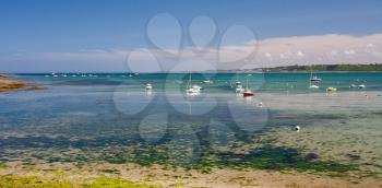 yacht mooring during ebb in Perros-Guirec, France