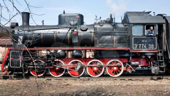MOSCOW,RUSSIA - APRIL 24: tourist attraction - working steam locomotive on April 24, 2011 in Moscow, Russia