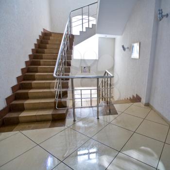 brown ceramic tile stairs in office building