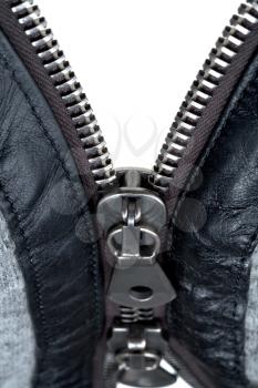 metal double zipper lock in unzip wool jacket. close-up
