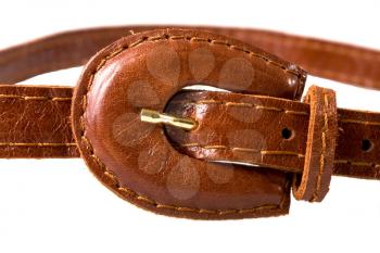 leather brown buckle of woman's belt
