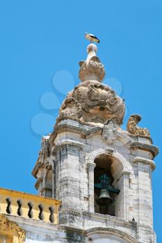 stork on tower of Carno church, Faro, Portugal