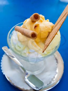 italian vanilla and lemon ice cream on blue table