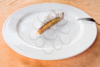 lemon cake on white plate in restaurant