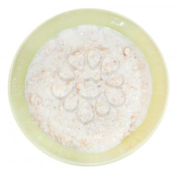 top view of simple english oat porridge with milk in yellow bowl isolated on white background