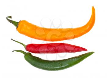 three pods of different hot peppers isolated on white background