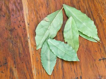 aromatic bay leaves on wooden table