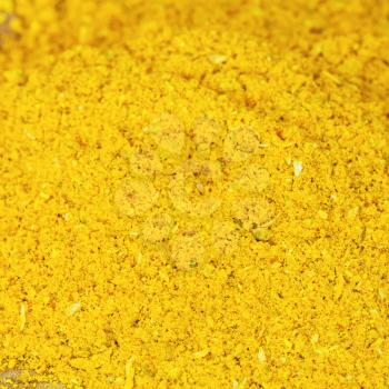 background from curry powder close up