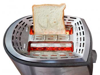 one fresh slice of bread on hot metal toaster isolated on white background