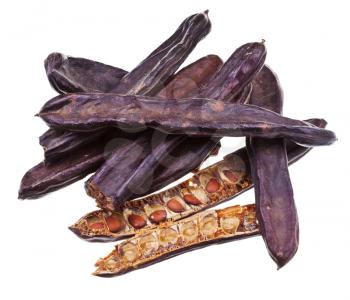 dried carob pods isolated on white background