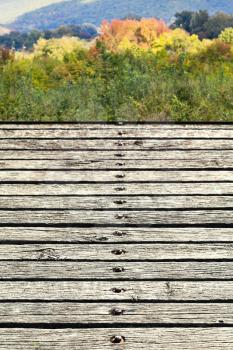 wood flooring and view of Caucasus Mountains in early autumn