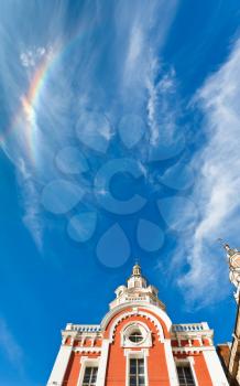 Saviour Cathedral of Zaikonospassky monastery in Moscow under rainbow in blue sky