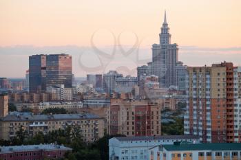 urban skyline with pink summer sunset in Moscow