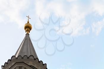 golden cross of church tower of Ivanovsky Convent in Moscow