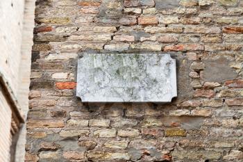marble street sign on old brick wall in ravenna, Italy
