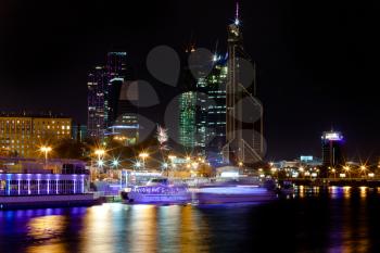 night panorama of Moskva River with Moscow city on background, Russia