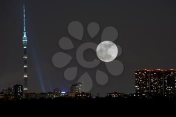 full moon under city, Ostankino television tower, Moscow