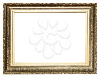 big wide golden ancient wooden picture frame with cut out canvas isolated on white background