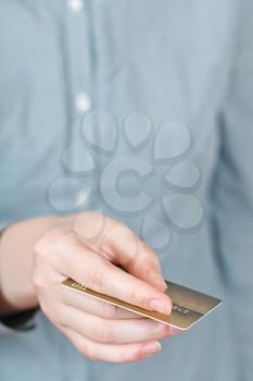 credit card in female hand close up
