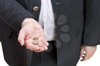 coins in businessman hand isolated on white background