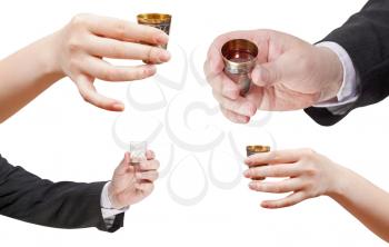 set of hands with glass of spirits isolated on white background
