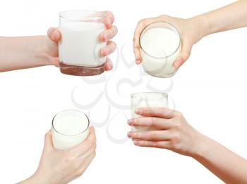 set of hand holding glass of milk isolated on white background
