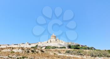 view from sea of The Citadella (Citadel) fortified city on Gozo island, Malta