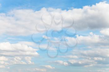 blue sky with layer of white clouds - natural background