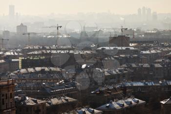 apartment houses lit by rising sun in Sokol district in Mocow in spring morning