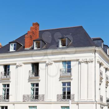 facade of old urban house in Nantes city, France