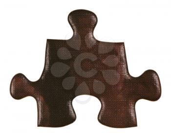 one brown piece of jigsaw puzzle isolated on white background
