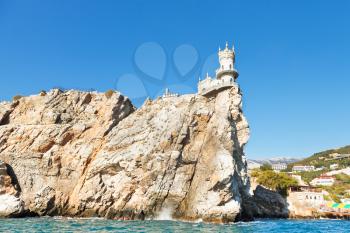 Aurora cliff with Swallow's Nest castle on Southern Coast of Crimea
