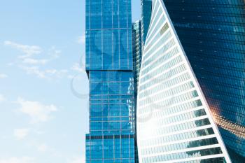 office towers from glass and metal in sunny day