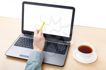business still life - laptop with cutout screen on office table isolated on white background