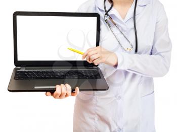 nurse points on computer laptop with blank screen isolated on white background