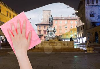 travel concept - hand deletes Bologna night cityscape by pink cloth from image and daily city view is appearing