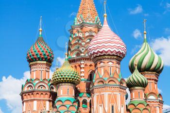 towers of Pokrovsky cathedral on Red Square in Moscow and blue sky in sunny summer day