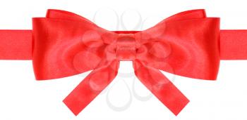 symmetric red satin bow with square cut ends on ribbon close up isolated on white background