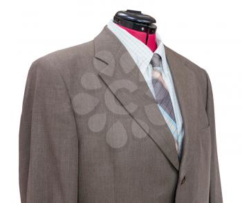 business suit on tailor mannequin - brown woolen jacket with shirt and tie close up isolated on white background