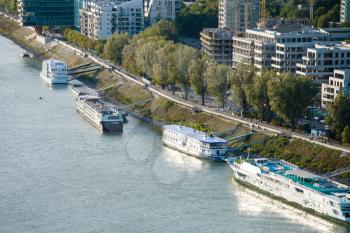 travel to Bratislava city - ships moored along Waterfront Army General Ludvik Svoboda (Nabrezie Armadneho Generala Ludvika Svobodu) on Danube river in Bratislava