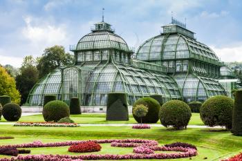 travel to Vienna city - Palm House, large greenhouse in garden of Schloss Schonbrunn palace, Vienna, Austria