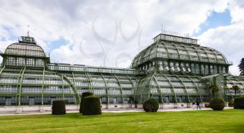 travel to Vienna city - Palmenhaus (Palm House) pavilion in garden of Schloss Schonbrunn palace, Vienna, Austria