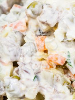 olivier russian salad with mayonnaise close up