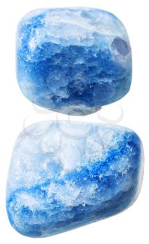 natural mineral gem stone - two blue colored agate gemstones isolated on white background close up