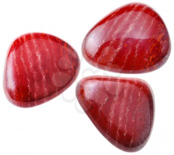 natural mineral gem stone - three red Jasper gemstones isolated on white background close up